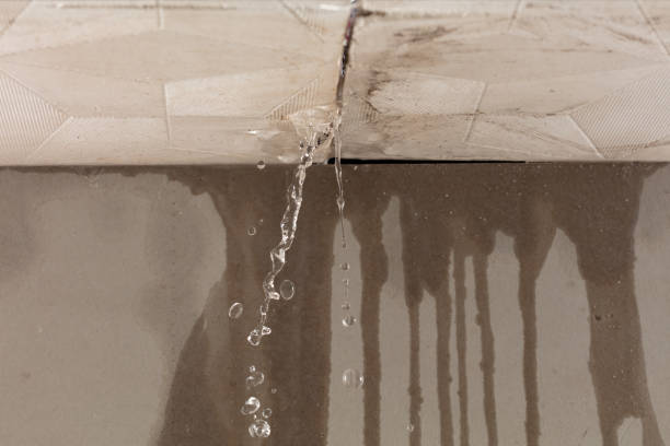 Professional Flood Damage Cleanup technician working in California, MO